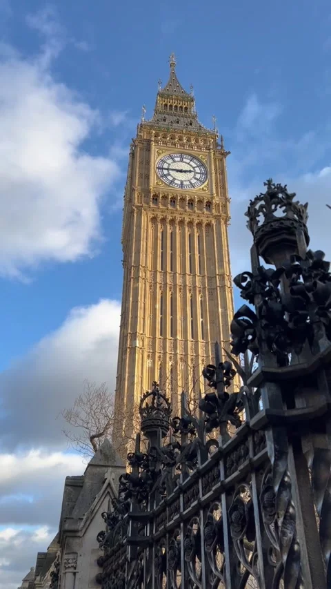 Low-angle of London's Big Ben clock tower, known as the Elizabeth Tower.  Stock Footage 317389964