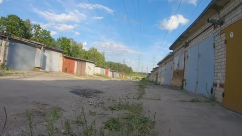 Low angle Look at a Soviet Garage Block with Energy Towers in Sight Stock Footage 135634345