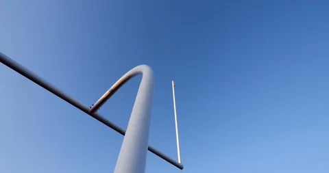 Low angle, looking up of a white goal post on a high school football field. Stock Footage 129103713