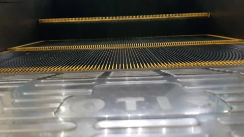 Low angle looped perspective view of modern escalator stairs. Automated ele.. Видео 272840689