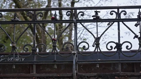 Low angle of love locks on a fence in Vilnius, Lithuania. 2nd October 2024 Stock Footage 288615517