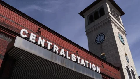 Low angle of Malmo Central Station sign and clock tower, Sweden Stock Footage 339286886