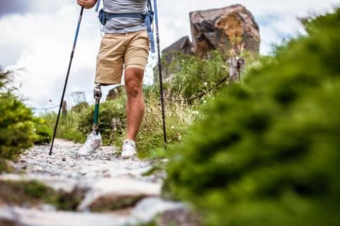 Low angle of a man with prosthesis having a walk Stock Photos