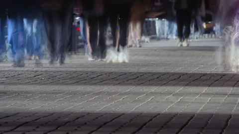 Low angle. Many people legs walk time lapse. Busy crowd in rush hour timelapse. Stock Footage 303485202