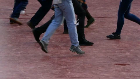 Low angle medium shot of feet of a group of dancers dancing together Stock Footage 103287955