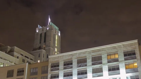 Low Angle Midtown Building and Nighttime Clouds Stock Footage 81221686