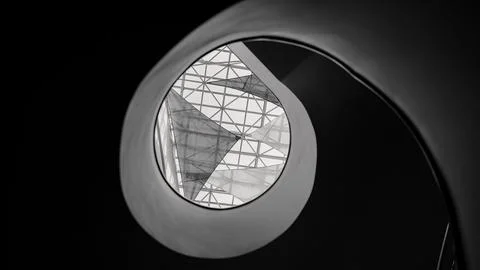 Low angle of a modern building's ceiling in grayscale 스톡 사진