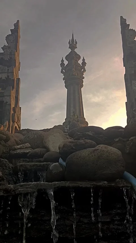 Low angle of The Monument of Balinese Struggle with water trickling down Stock Footage 311833405