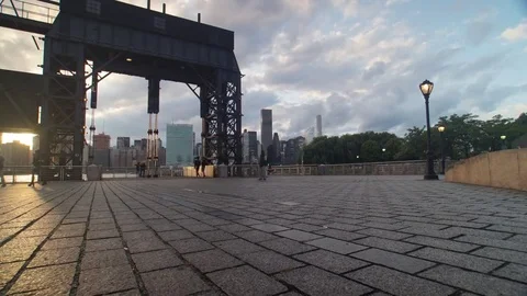 Low Angle Motion Control Sunset Time-lapse by the New York City skyline Stock Footage 80164142