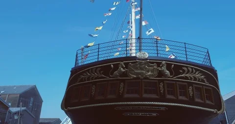 Low angle move around the restored gold painted details on the stern of Isambard Stock-Footage 108040034