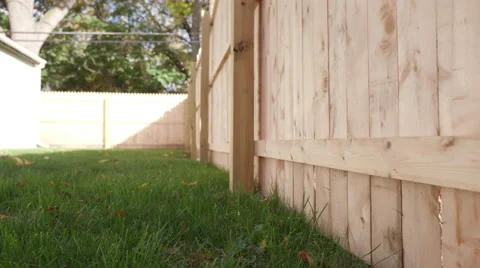 Low Angle Move Backward and Forward Side of New Fence Stock Footage 68778126