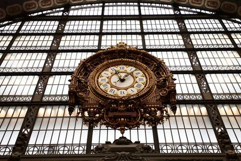 Low angle of the Musee d'Orsay Clock in Paris, France Stock Photos