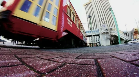 Low Angle New Orleans Streetcar Passes Stock Footage