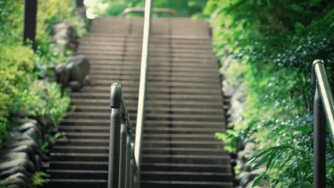 Low angle of outdoor stairs and handrail with blurred background Stock Footage 346362914