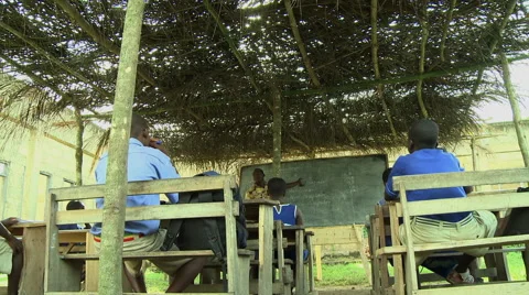 LOW ANGLE: PAKRO OUTDOOR CLASSROOM TEACHER TEACHES Stock Footage 58106640