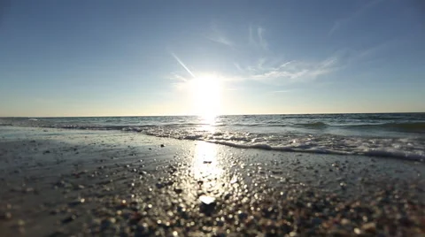 Low Angle Pan of Ocean at Sunset Stock Footage 46308697