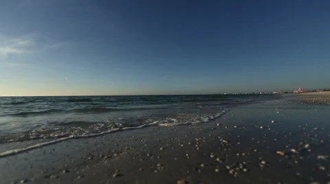 Low Angle Pan of Ocean at Sunset Stock Footage 46308908