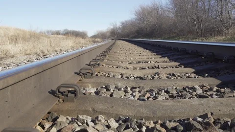  Low angle Pan Rail Road Tracks Stock Footage 92436481