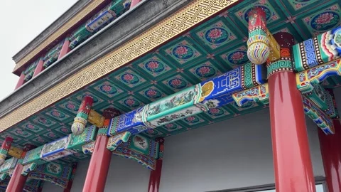 Low Angle Pan Right Shot of Traditional Chinese Ornate Ceiling 動画素材 333472404