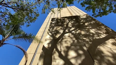 Low Angle Pan of Skyscrapers and Office Buildings in Sunny American Downtown Stock Footage 329440411