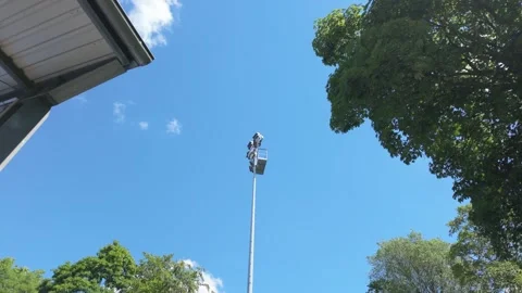 Low Angle Pan of Stadium Floodlight at Outdoor Sports Facility Video stock 336723539