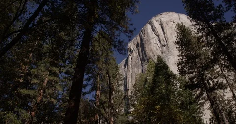 Low-angle pan view of El Capitan, Yosemite National Park, LM98, Shot with the Video stock 103448858
