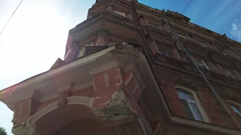 Low angle panning shot of an old historic building against blue sky. Stock-Footage 244525081