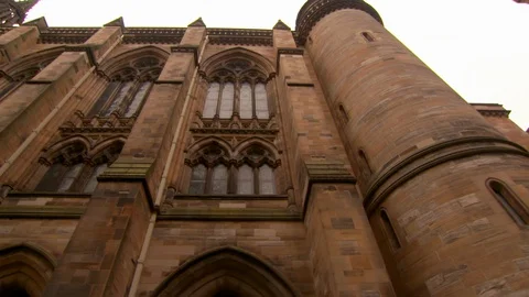 Low angle panning shot of public university building in city against sky - Stock Footage 129233192