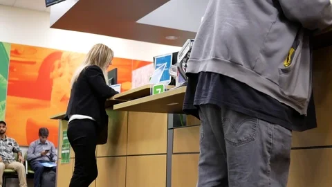 Low angle of people line up for applying driver license at reception site Stock Footage 83291418