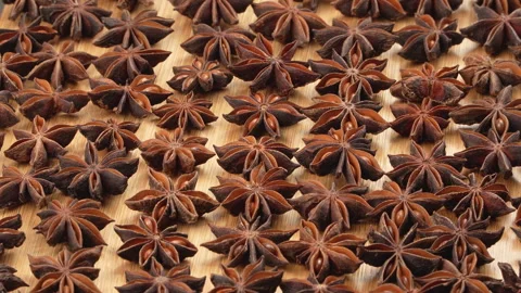 Low Angle Perspective Of Dried Star Anise On Wooden Board Vídeos de archivo 331375883