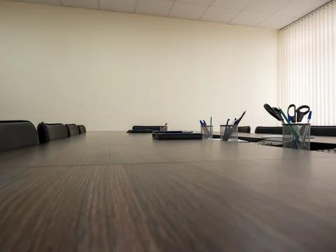 Low angle perspective of empty boardroom table 库存照片