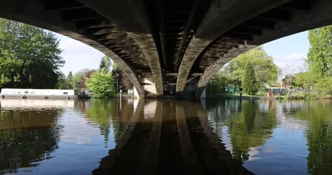 Low-angle perspective from water level looking up at the geometric structure und Stock Footage 308418558