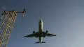 Low angle as plane comes in land HD Footage