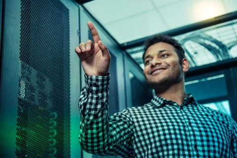 Low angle of a positive nice man being at work Foto stock