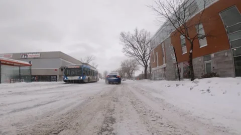 Low Angle POV Driving Along Icy Snow Covered Road In Ville Marie Stock Footage 170348828