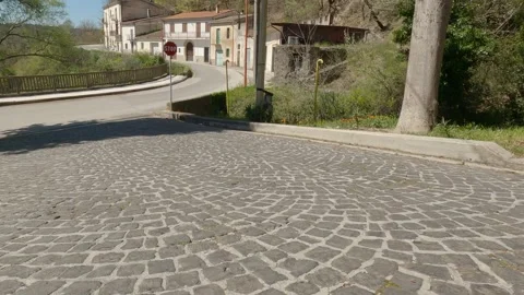 Low-Angle POV Driving on Cobblestone Road Towards Cerro al Volturno, Italy 動画素材 332429519