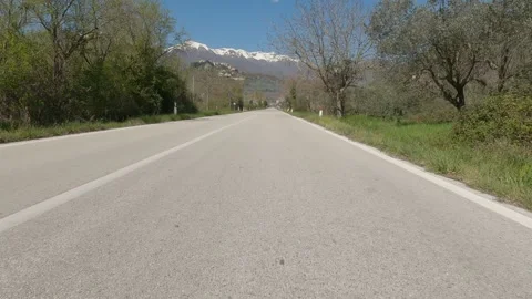 Low-Angle POV Driving Towards Castel San Vincenzo Hilltop Village, Italy Vídeos de archivo 332429583