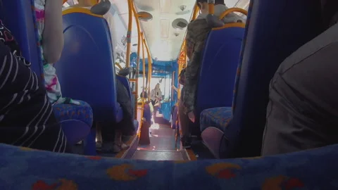Low Angle POV on London Double-Decker Bus Aisle During Busy Daytime Commute Stock Footage 335403246