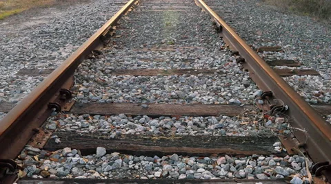Low angle of railroad tracks (centered), 4K Stock Footage 47260241