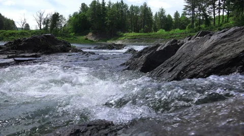 Low Angle Rushing Rapid River Water In Forest Ottauquechee River Vermont Stock-Footage 52098063