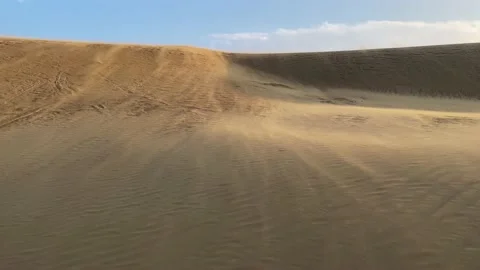 Low angle sand blowing Video stock 239366735