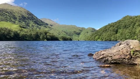 Low angle scotlish highlanf loch 動画素材 282954408