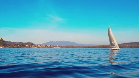 Low angle sea level view of yacht sailing in calm waters Видео 279905191
