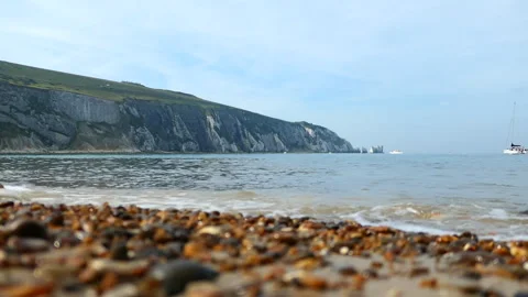 Low angle of the sea looking out to the cliffs at Alum Bay (Isle of Wight) Stock Footage 244850604