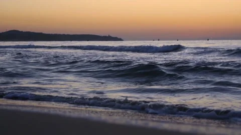 Low Angle Sea Surf At Sunset Stock Footage 227718127