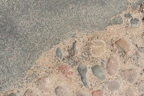 Low angle selective focus on asphalt overlay paving on top of a concrete ba.. Stock Photos