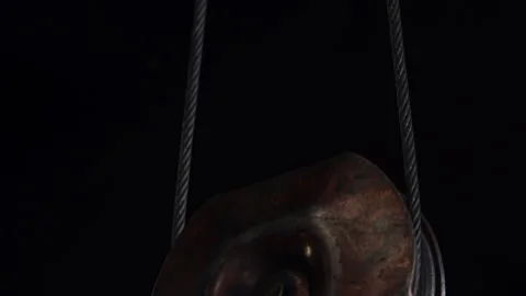 Low angle shop huge metal hook moves past camera in plant 스톡 동영상 101046060