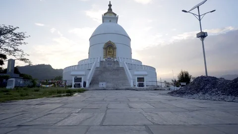 Low angle short time lapse moving towards Peace Pagoda in Pokhara, Nepal Video stock 91166196
