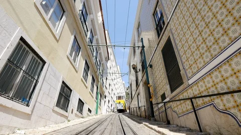 Low angle shot of arriving Lavra Funicular in the city center of Lisbon in a hot Stock Footage 89385929