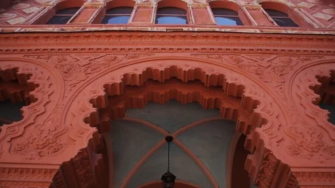 Low angle shot of a beautiful old monumental red construction. Red brick Stock Footage 99603515